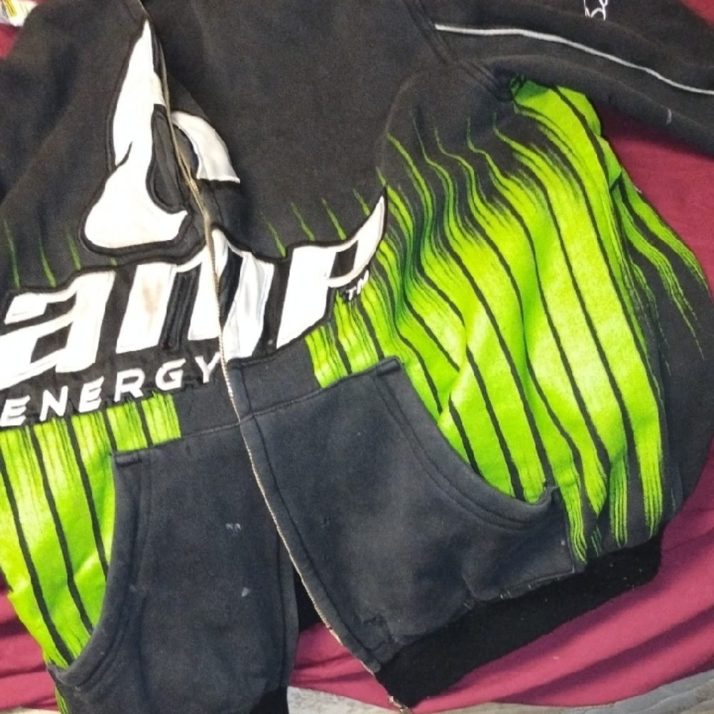 Dynamic Black and Green Performance Jacket with Angular Graphics